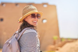 Tourist woman in Karnak Temple in Luxor Egypt